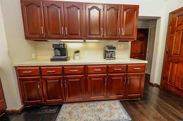 kitchen with dark hardwood / wood-style floors