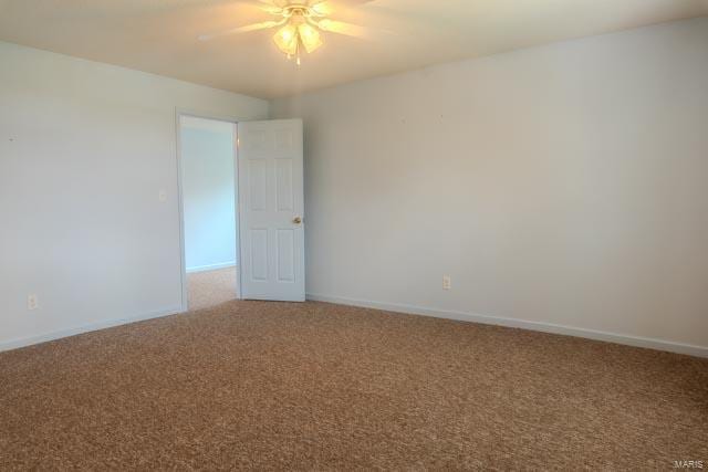 unfurnished room featuring carpet floors