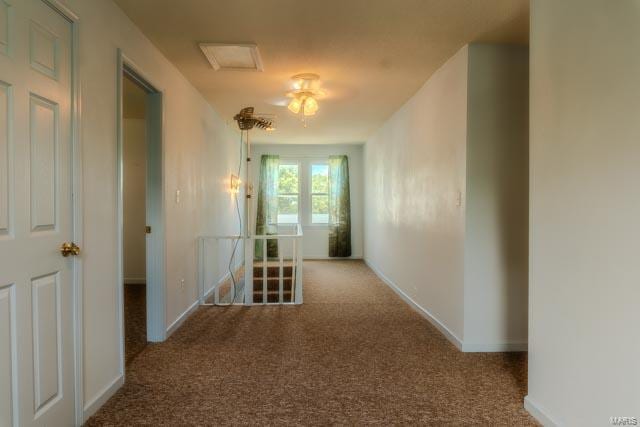 corridor with carpet floors