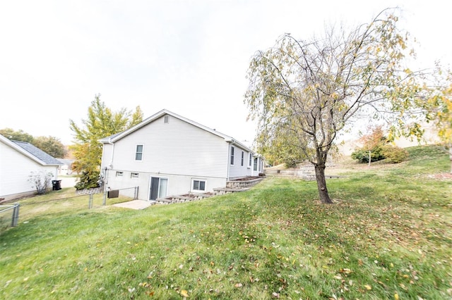 view of property exterior featuring a yard