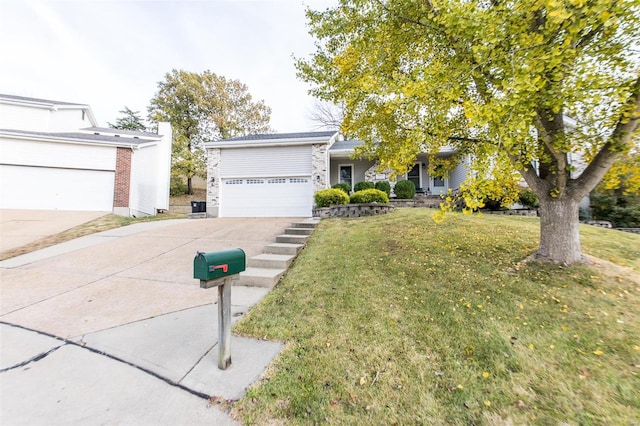 view of front facade featuring a front lawn and a garage