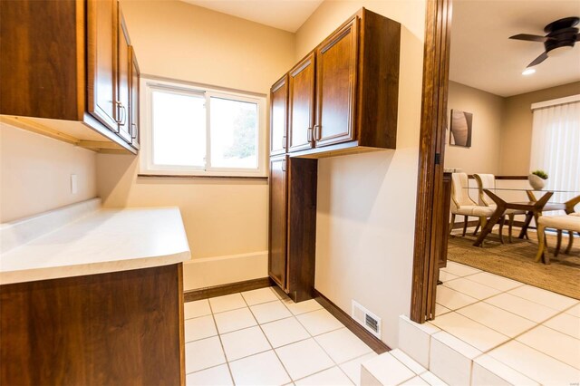 washroom with light tile patterned flooring and ceiling fan