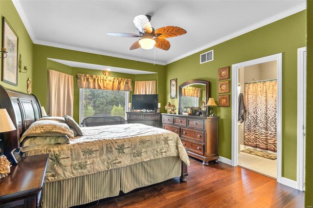 bedroom featuring ceiling fan, dark hardwood / wood-style floors, and ornamental molding