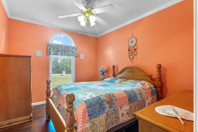 bedroom featuring hardwood / wood-style flooring, crown molding, and ceiling fan