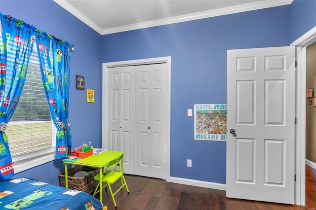 bedroom featuring hardwood / wood-style floors, ornamental molding, and a closet