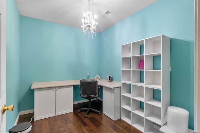 home office featuring dark wood-style floors, a chandelier, visible vents, and baseboards