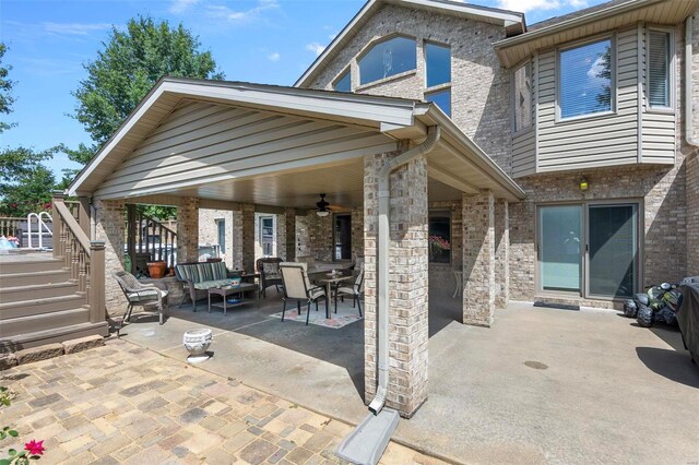 view of patio with ceiling fan