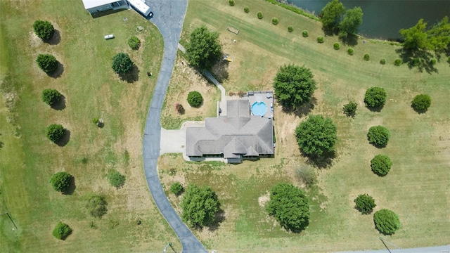 birds eye view of property featuring a rural view and a water view