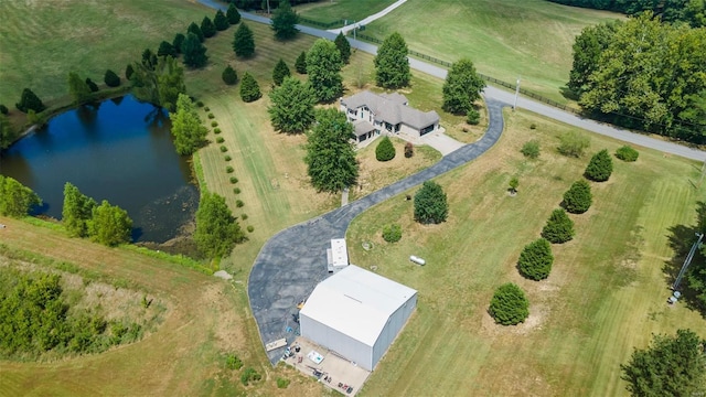 drone / aerial view with a rural view and a water view