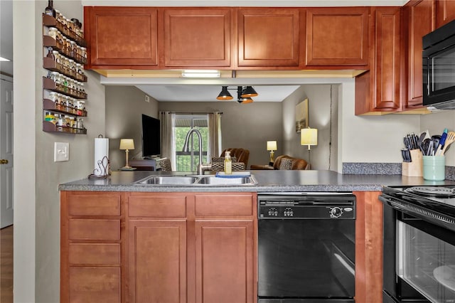 kitchen featuring black appliances and sink