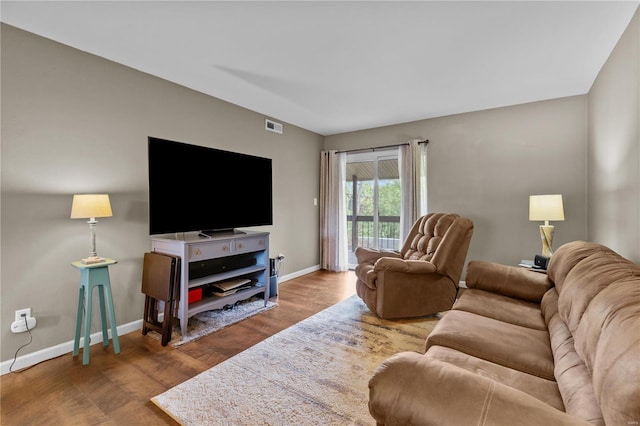 living room with hardwood / wood-style flooring