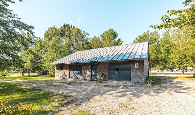 view of outdoor structure featuring a garage