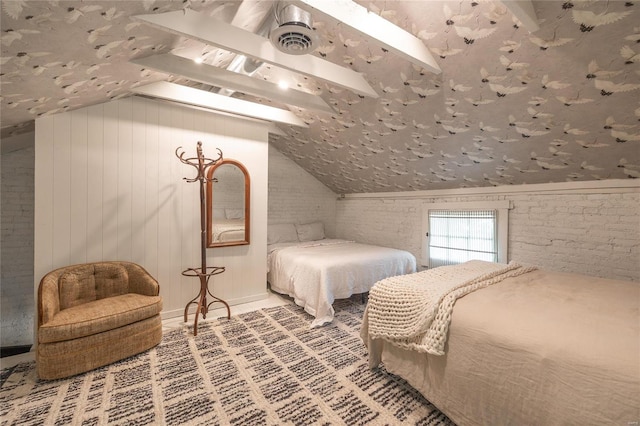 bedroom with ceiling fan and vaulted ceiling with beams