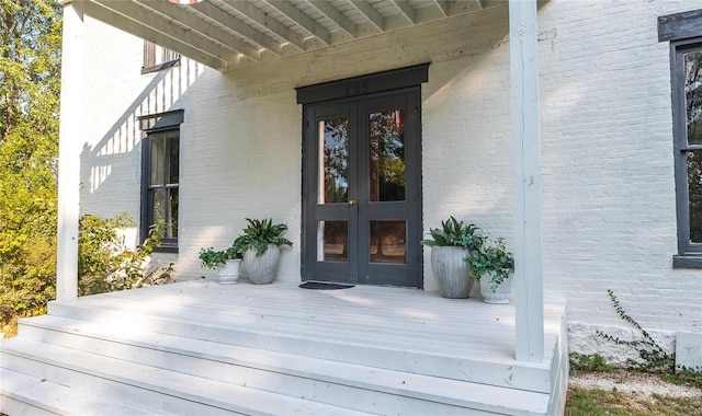 entrance to property featuring french doors