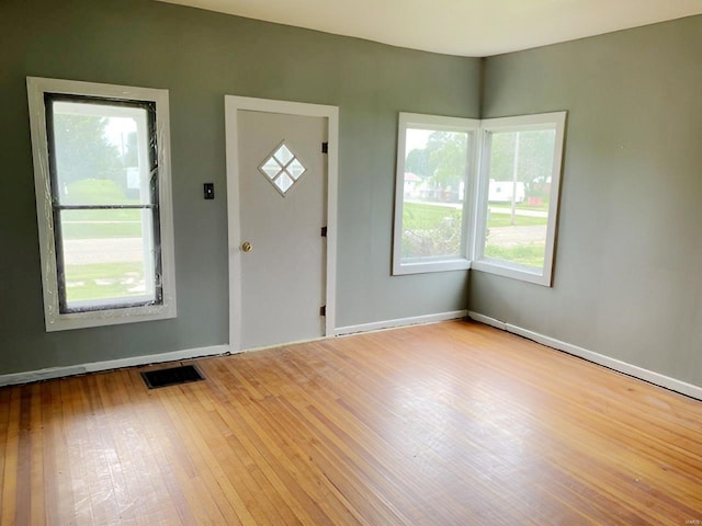 entryway with visible vents and light wood-style floors