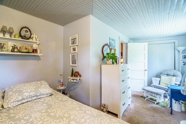 carpeted bedroom featuring wooden ceiling