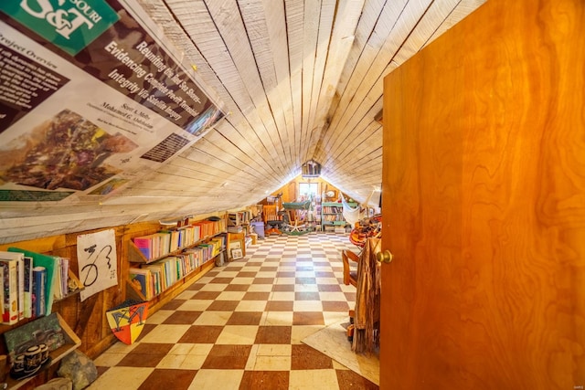 bonus room with lofted ceiling, light tile patterned floors, and wooden ceiling