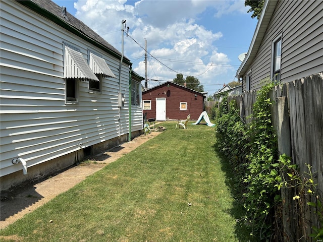 view of yard with a fenced backyard