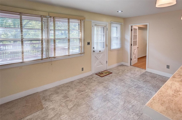 foyer with baseboards