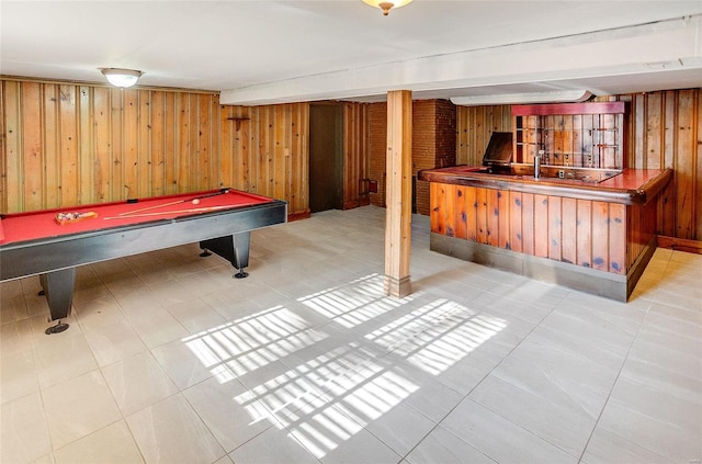 game room featuring wood walls, tile patterned floors, and pool table