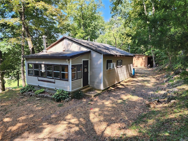 exterior space featuring cooling unit