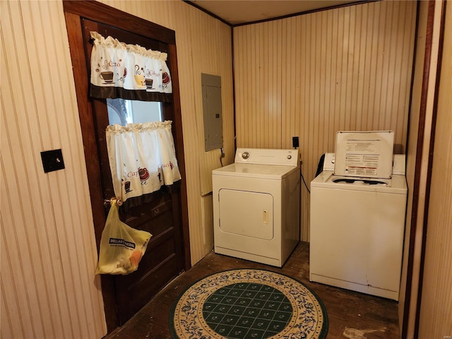 laundry room featuring washing machine and dryer, laundry area, and electric panel