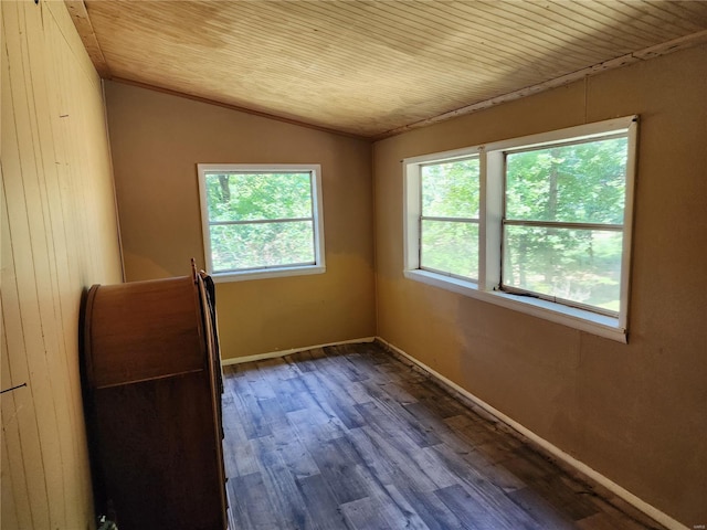 unfurnished room featuring wood ceiling, baseboards, vaulted ceiling, and dark wood-style flooring