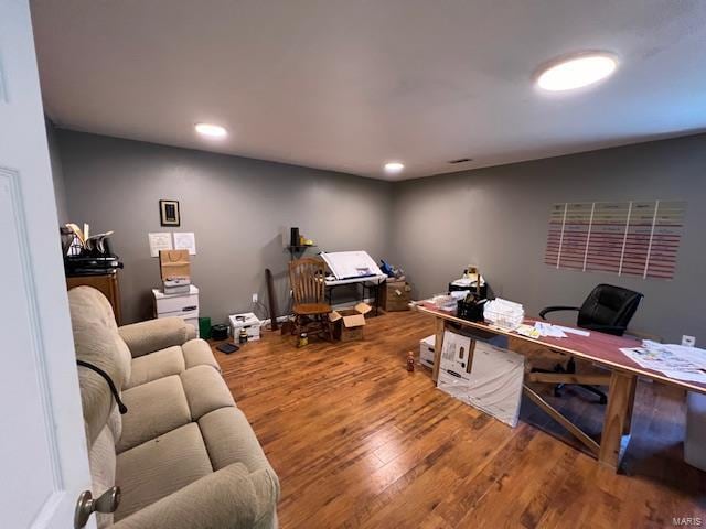 office area with wood-type flooring