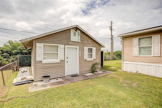 view of outdoor structure with a yard