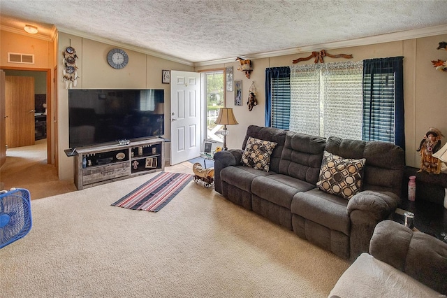 carpeted living room with a textured ceiling, ceiling fan, and crown molding