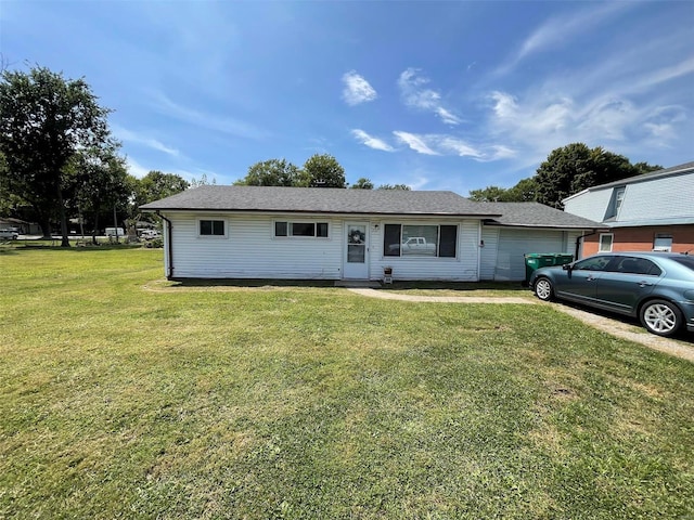 single story home featuring a front yard