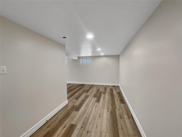 basement featuring light hardwood / wood-style flooring