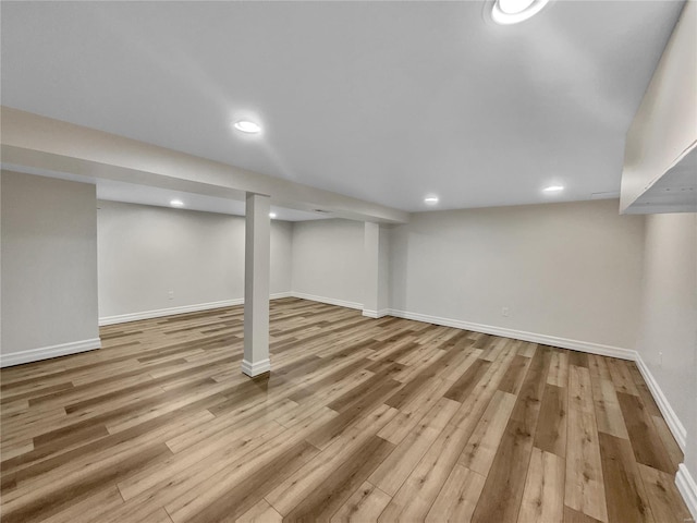 basement featuring light wood-type flooring