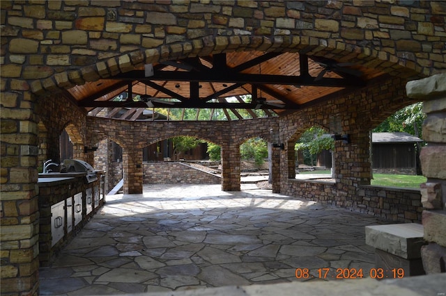 view of patio / terrace featuring ceiling fan, a gazebo, and area for grilling