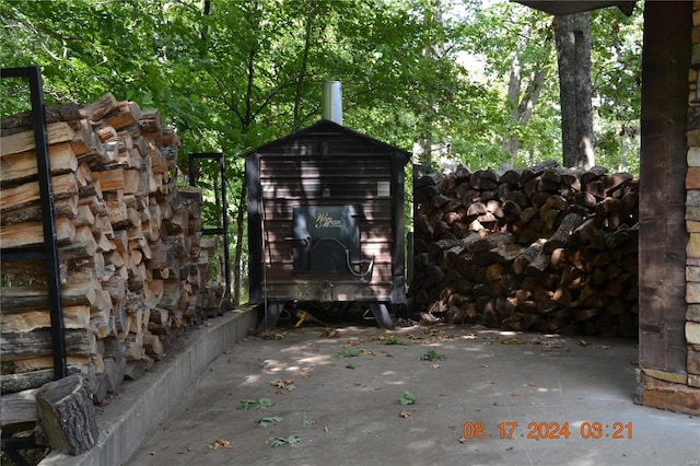 view of patio / terrace with an outbuilding