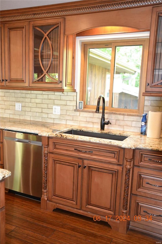 kitchen featuring decorative backsplash, dark hardwood / wood-style floors, and dishwasher