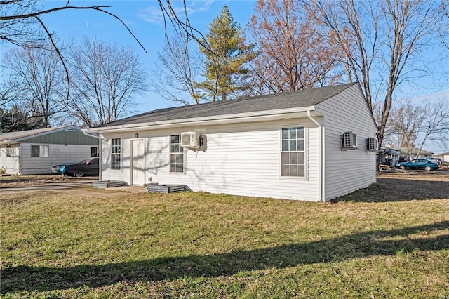 view of home's exterior with a yard