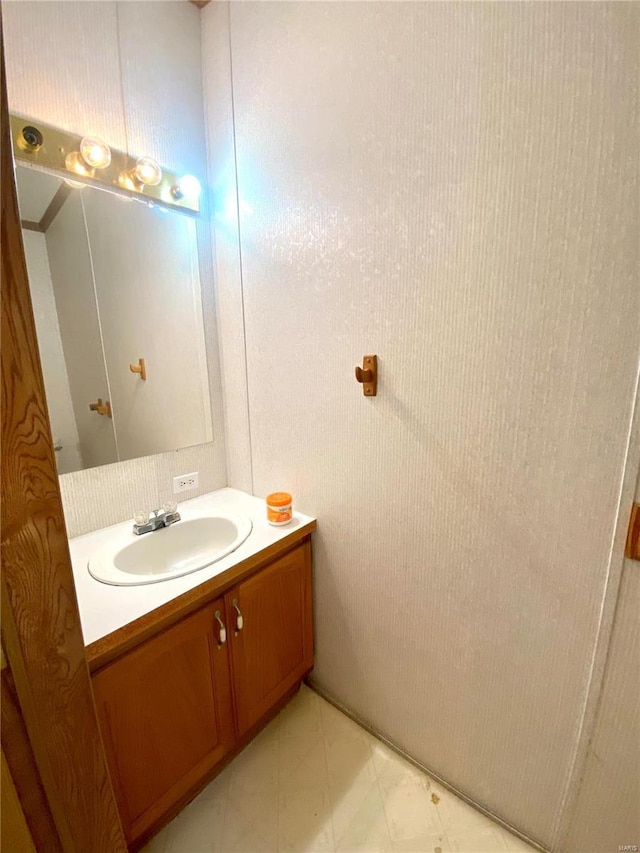 bathroom with vanity and tile patterned floors