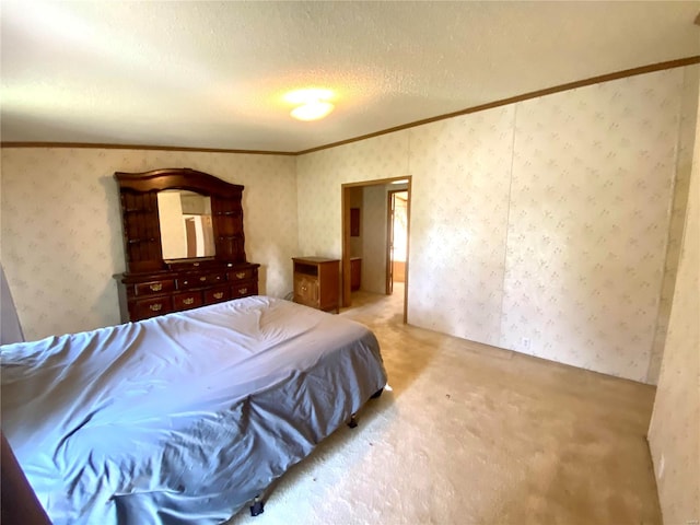 bedroom featuring light carpet, ornamental molding, a textured ceiling, and wallpapered walls