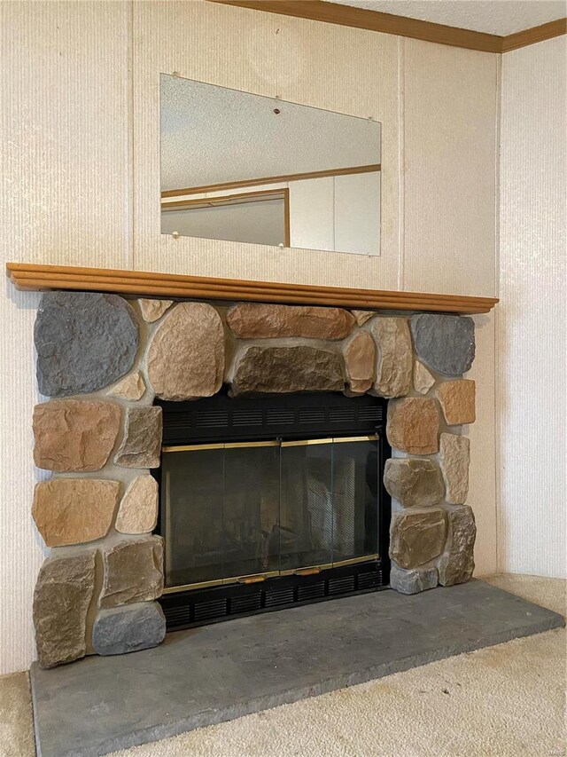 details with a stone fireplace