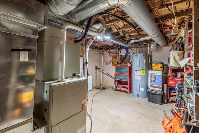 utility room featuring water heater and heating unit