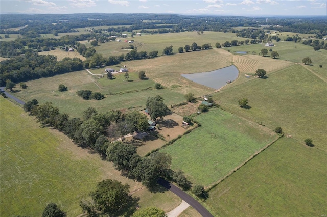 drone / aerial view with a rural view and a water view