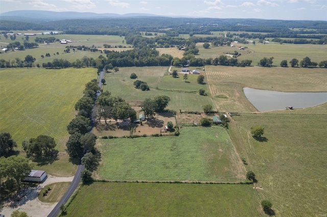 aerial view with a rural view and a water and mountain view