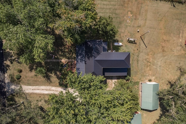 birds eye view of property with a rural view