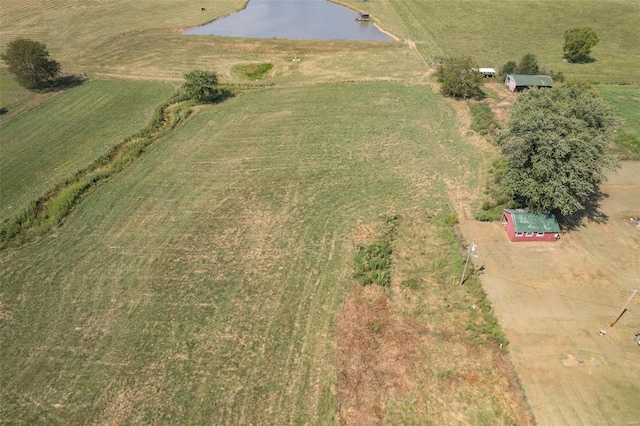 drone / aerial view with a water view and a rural view