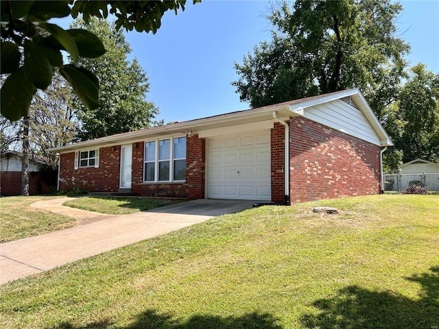 single story home featuring a front yard and a garage