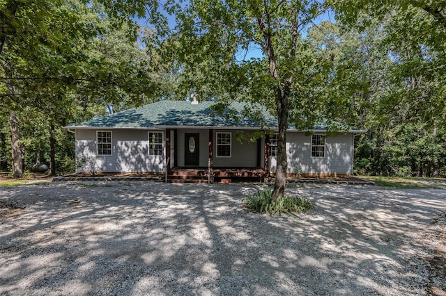 ranch-style house featuring a porch