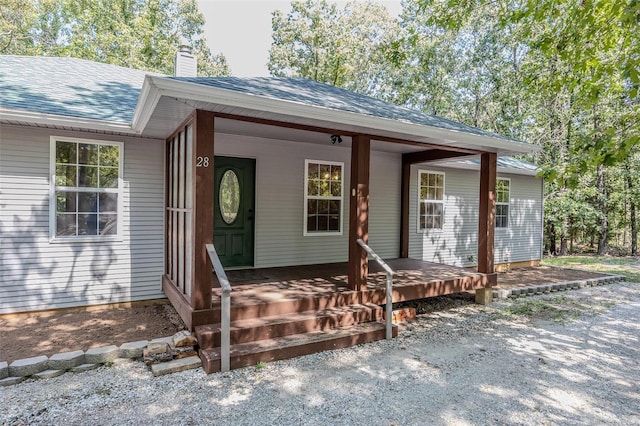 ranch-style home with a porch