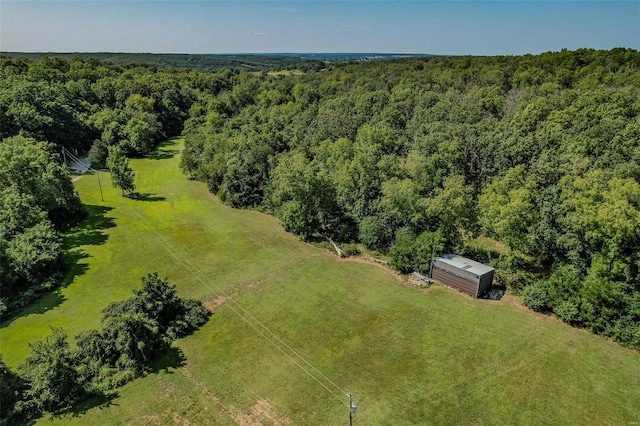 birds eye view of property featuring a rural view