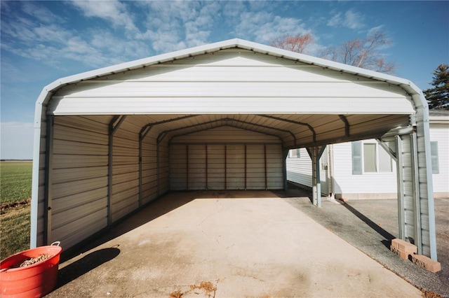 view of parking / parking lot featuring a carport